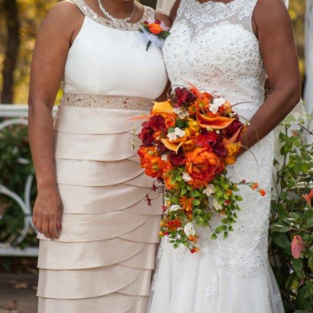 Beautiful size 14 mother of the bride champagne long dress from Dillard's.